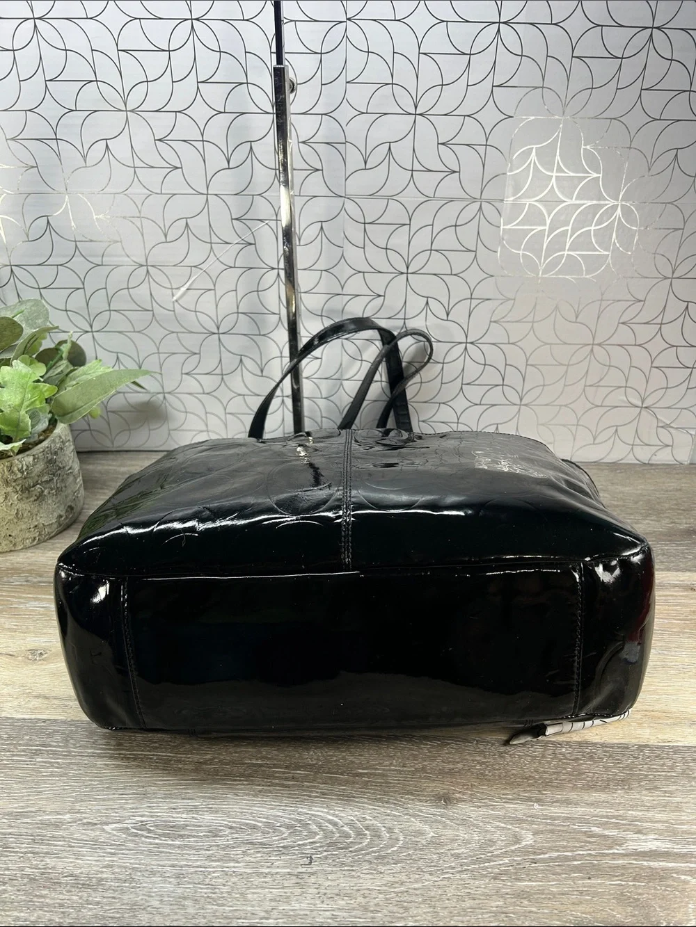 Coach black patent leather zip top tote bag
